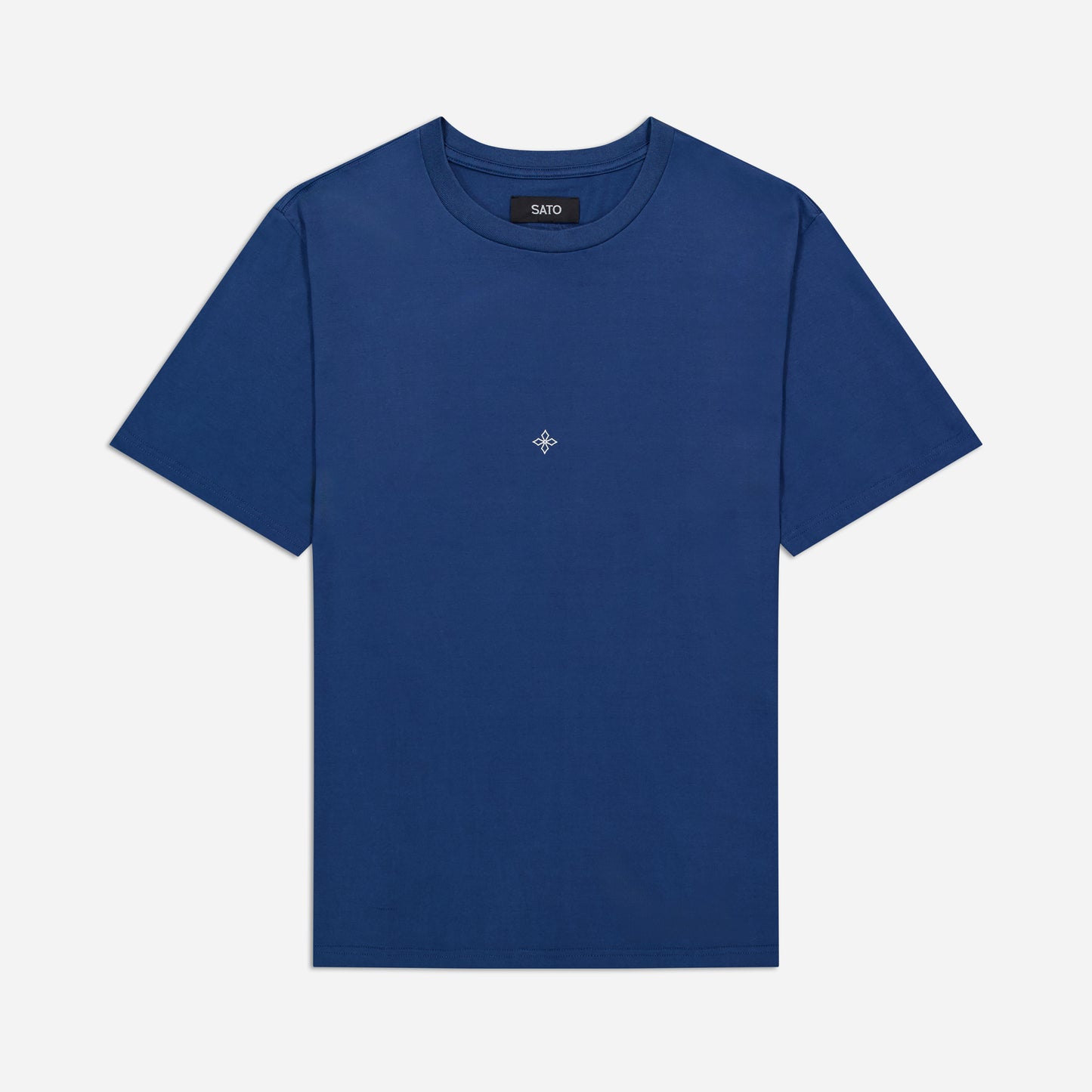 Blue t-shirt with a small logo on a light gray background