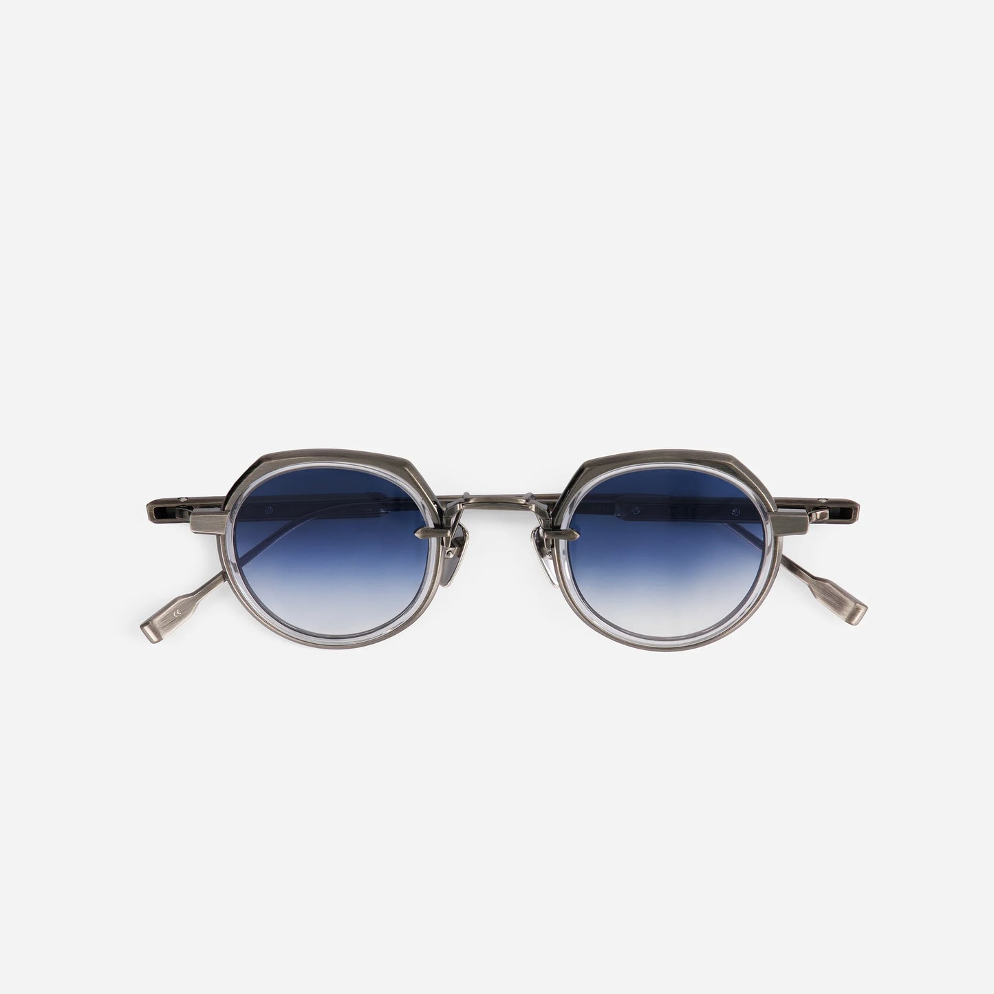 Revati AS-1 sunglasses in antique silver with a crystal insert and blue gradient lenses, crafted in Japan by SATO. Available as a limited edition.