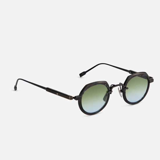 Revati BB/AS-1 features brushed black and antique silver bi-color frames with a tortoise insert, crafted by SATO in Japan. Numbered sunglasses
