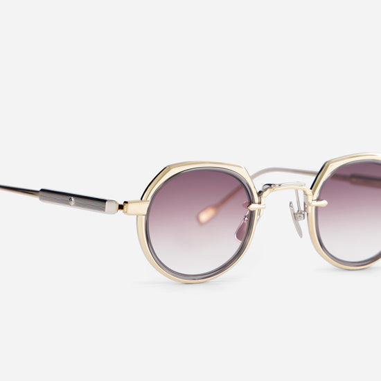 Revati-T LG/P1 sunglasses combine lunar gold and platinum with a crystal grey insert, crafted by SATO in Japan