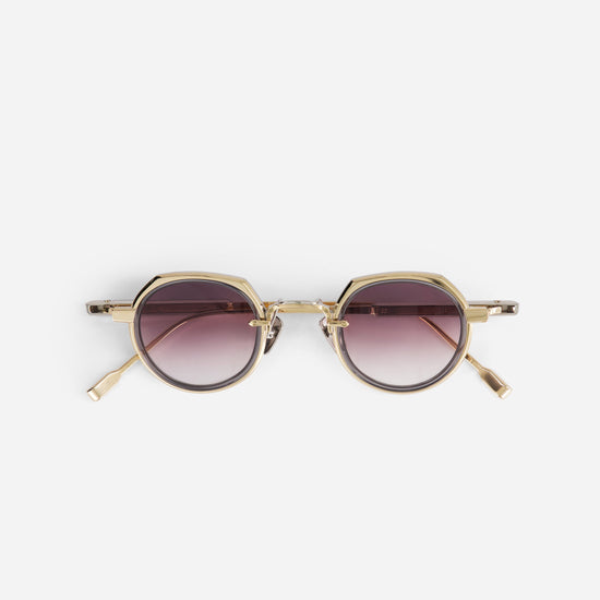 Revati-T LG/P1 sunglasses in lunar gold and platinum with a crystal grey insert, crafted in Japan by SATO.