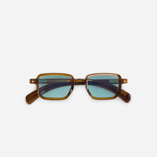 Ran MC-1 showcases a Japanese acetate frame with Maple Crystal color (clear brown) and Blue flash lenses.
