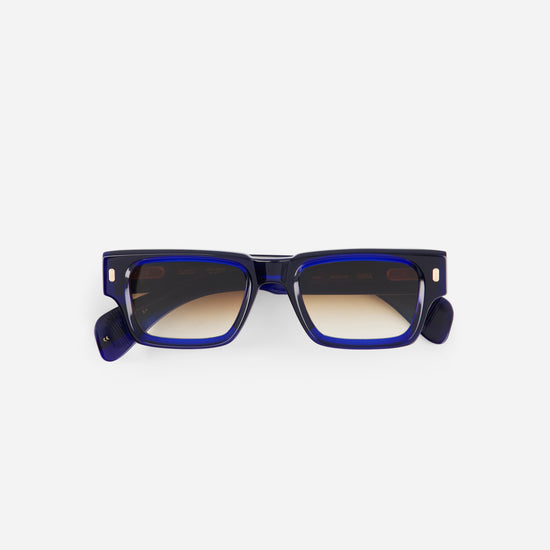 Blue sunglasses with a white background