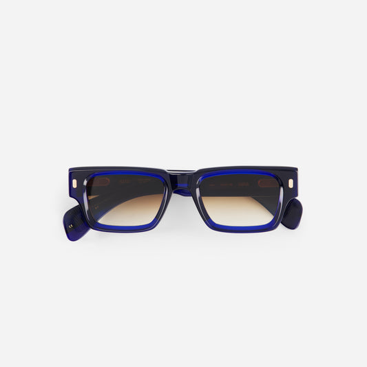 Blue sunglasses with a white background