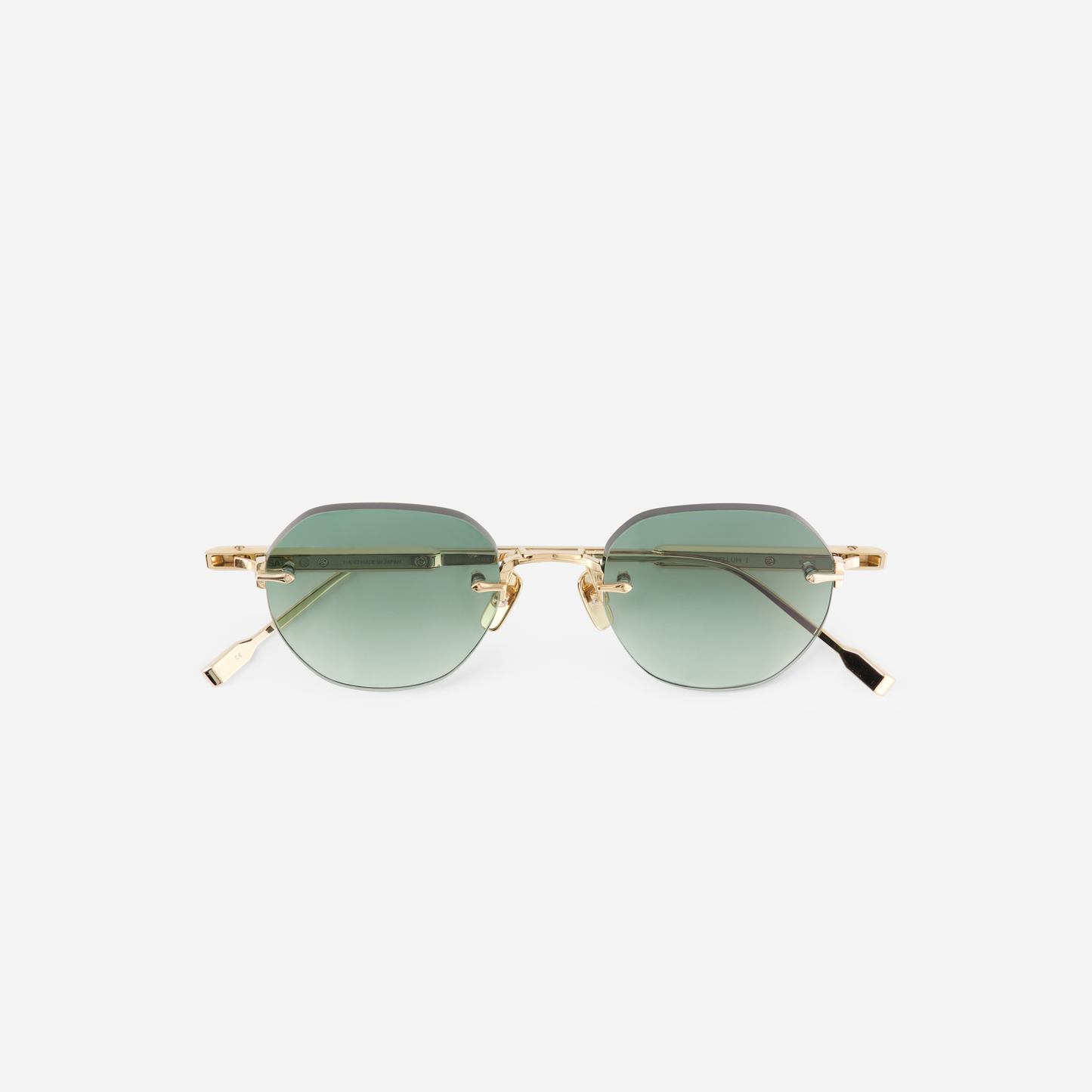 Discover unparalleled chicness with Terebellum Rimless, adorned in Lunar Gold and green-tinted lenses
