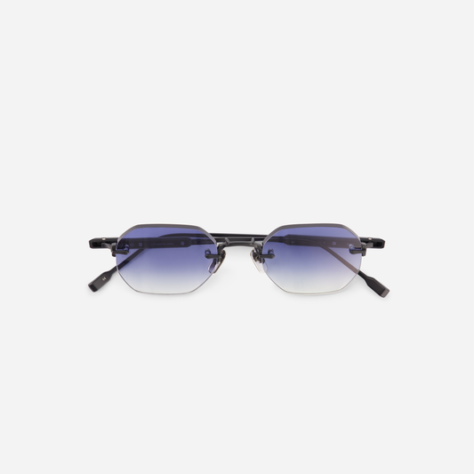 Terebellum II S707 Titanium frame featuring a matte black coating and complemented by gradient blue lenses