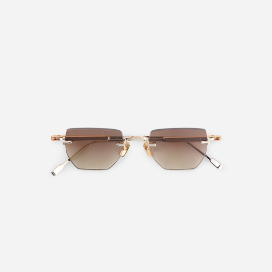Sato Rimless Collection: Introducing the Terebellum III S804, adorned with a Titanium frame and the elegance of rose gold & platinum, complemented by captivating gradient brown lenses.