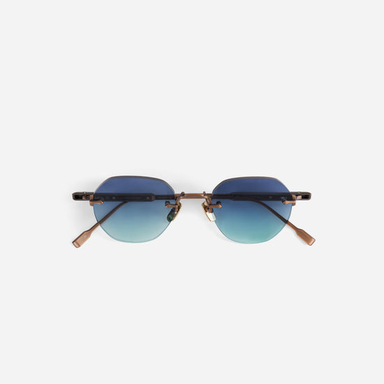 Sunglasses with gradient blue lenses on a white background