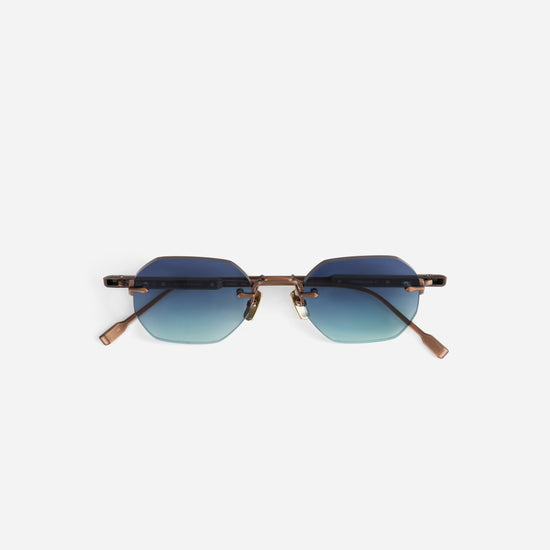 Sunglasses with gradient blue lenses and antique bronze frame 