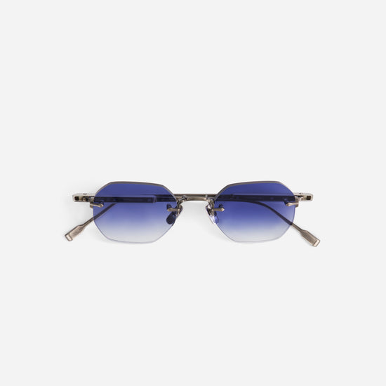 Sunglasses with blue gradient lenses and antique silver temples made by sato
