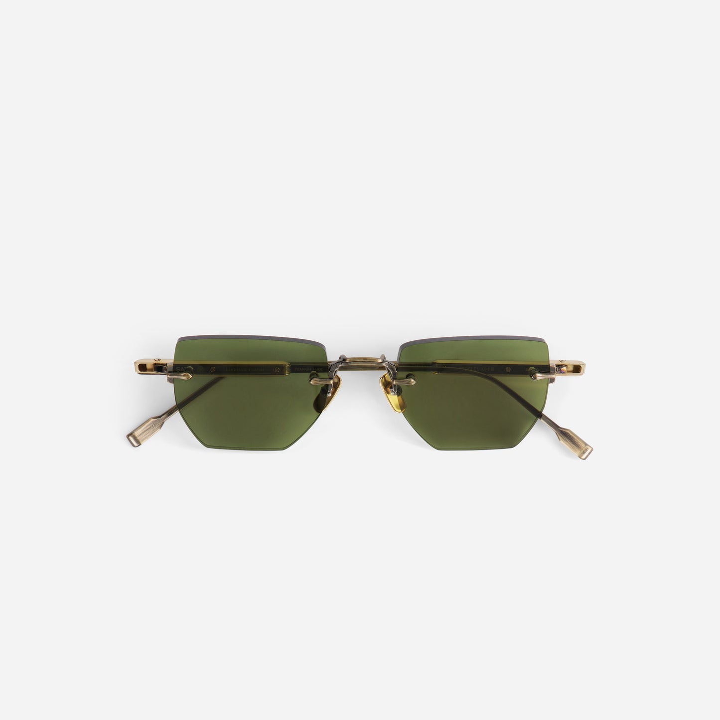 Sunglasses terebellum III with gold frame and green lenses on a white background