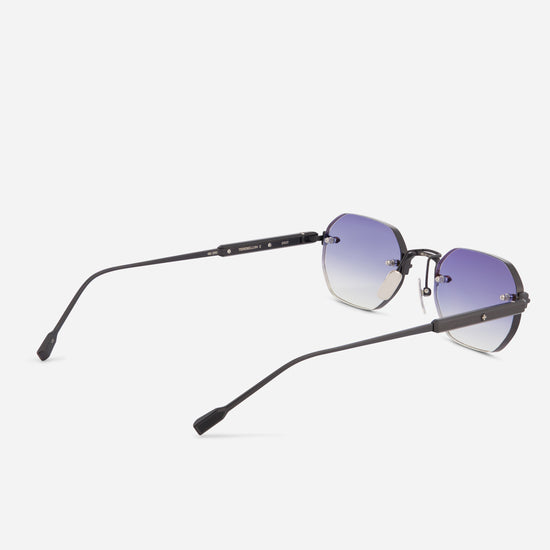 A pair of rimless square sunglasses with a dark gunmetal frame and gradient purple-to-clear lenses, shown from a three-quarters angle on a light gray background.