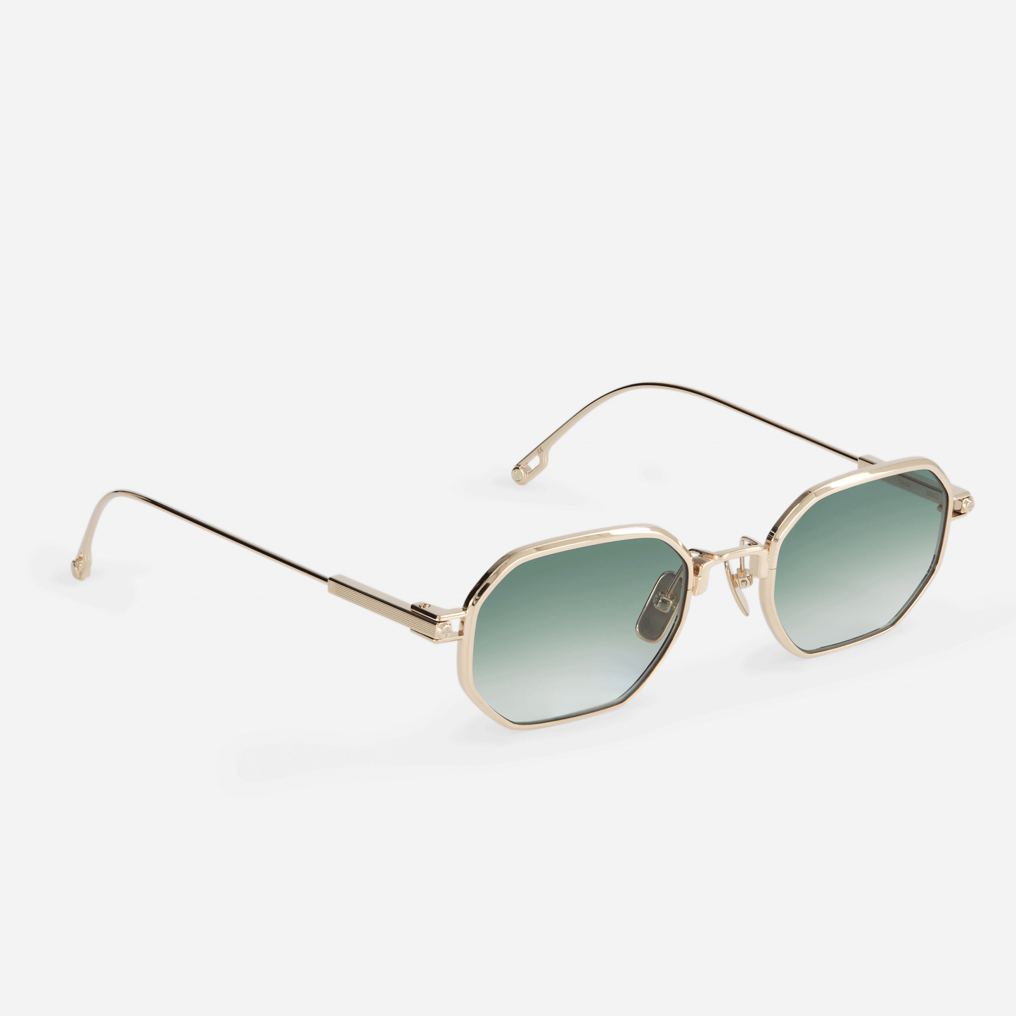 Timir S502 hexagonal glasses, meticulously handcrafted from premium Japanese titanium in the striking Lunar Gold hue, featuring mesmerizing olive gradient lenses.