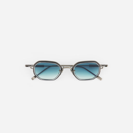 Sunglasses with gradient lenses on a white background