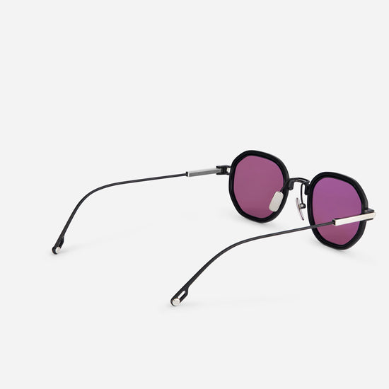 Toliman-T S3305 hexagonal sunglasses. Crafted from pure black titanium, these eyewear pieces feature vibrant purple lenses and a sleek black insert.