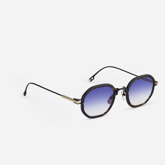  Toliman-T S3306 hexagonal sunglasses. Made from high-quality black titanium, these distinctive eyewear pieces feature dark blue gradient lenses for a sleek look, accentuated by a fashionable tortoise insert.