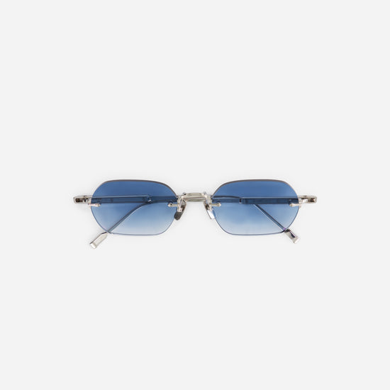 Terebellum IV S1001 sunglasses in platinum feature a sleek rimless design with striking blue gradient lenses