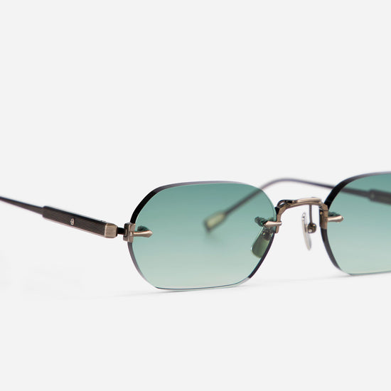 Terebellum IV S1008 sunglasses feature a rectangular rimless design with antique silver temples and soft turquoise gradient lenses.