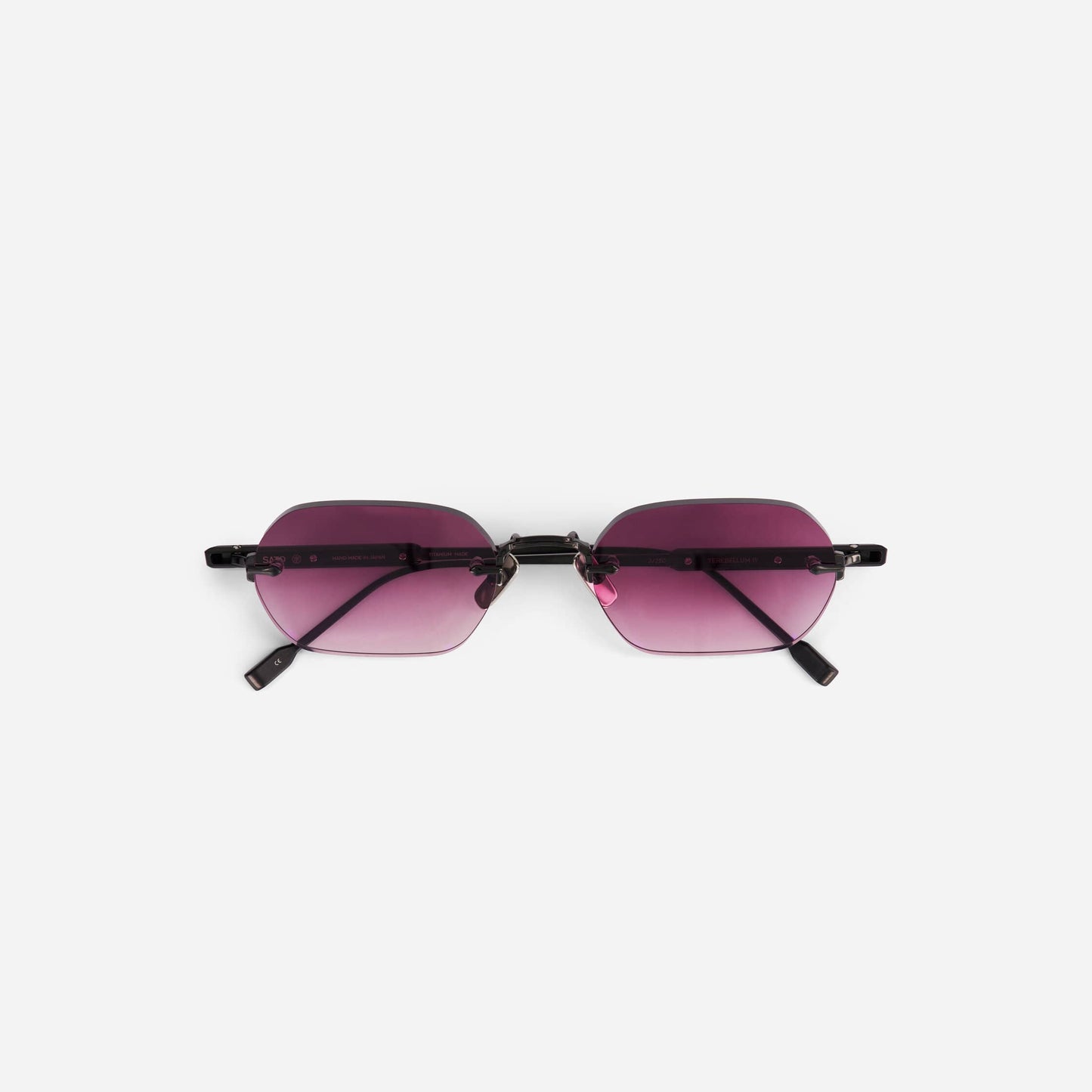 Terebellum IV S1010 sunglasses feature a rectangular rimless design in brushed black with pink gradient lenses, channeling 90s-inspired style.