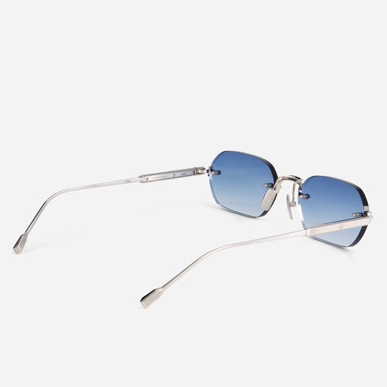 With its rimless platinum frame and blue gradient lenses, the Terebellum IV S901 offers a modern and lightweight design.