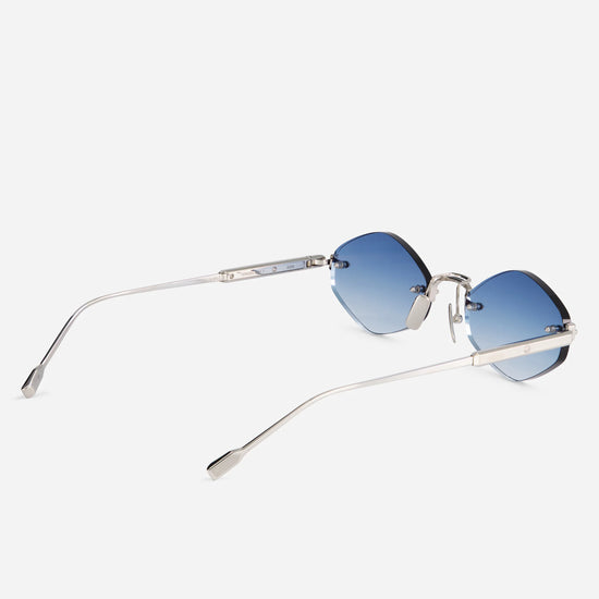 Terebellum V S1201 sunglasses showcase a rimless platinum frame paired with stylish blue gradient lenses, delivering a minimalist aesthetic