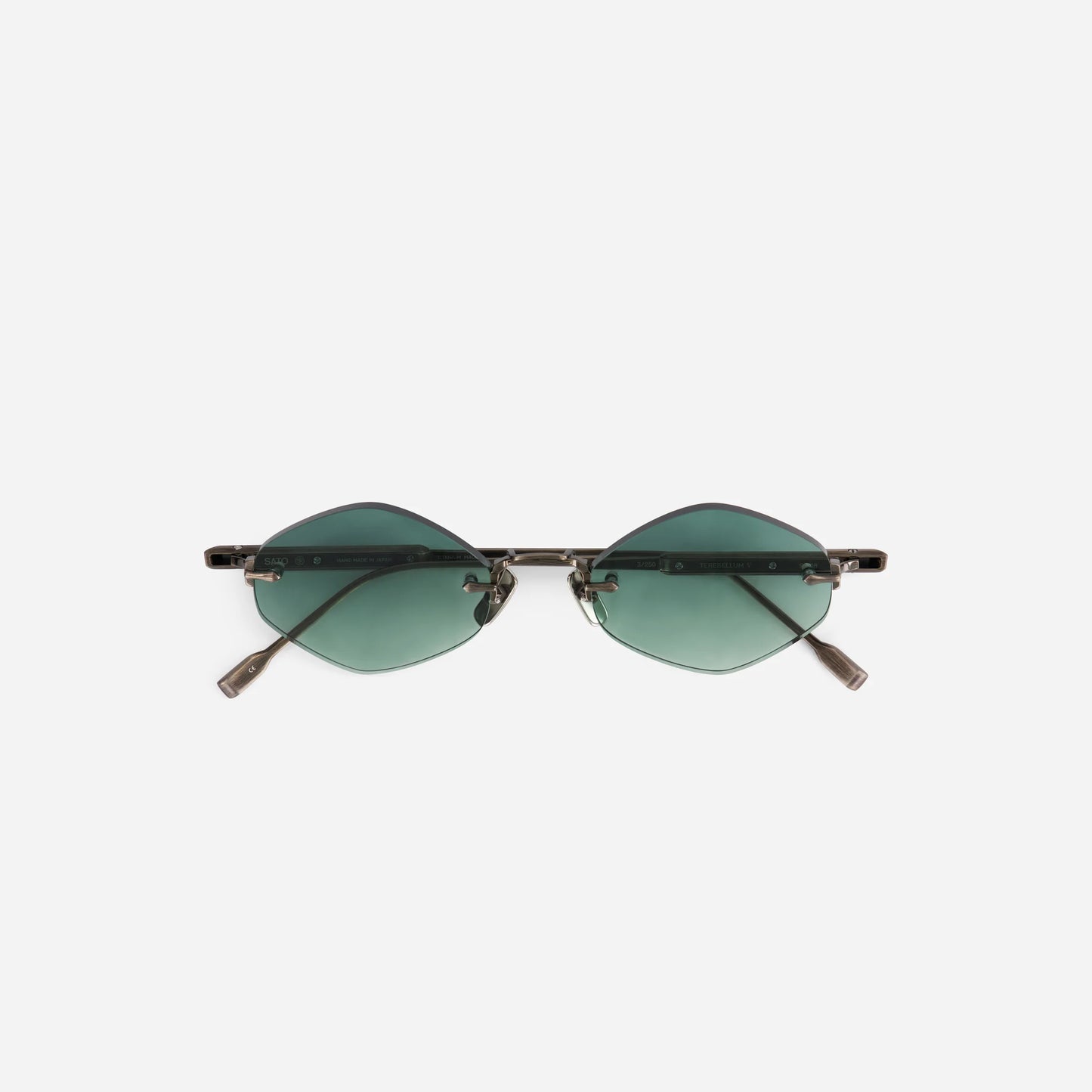 Terebellum V S1208 sunglasses in antique silver feature a rimless design with vibrant turquoise lenses.