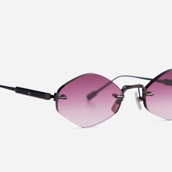 Terebellum V 1210 showcases a brushed black rimless frame, enhanced by soft pink gradient lenses.