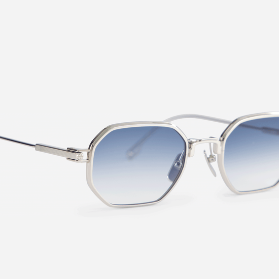 Timir S501, exquisitely designed hexagonal glasses made from pure Japanese titanium, showcasing trendy blue gradient lenses.