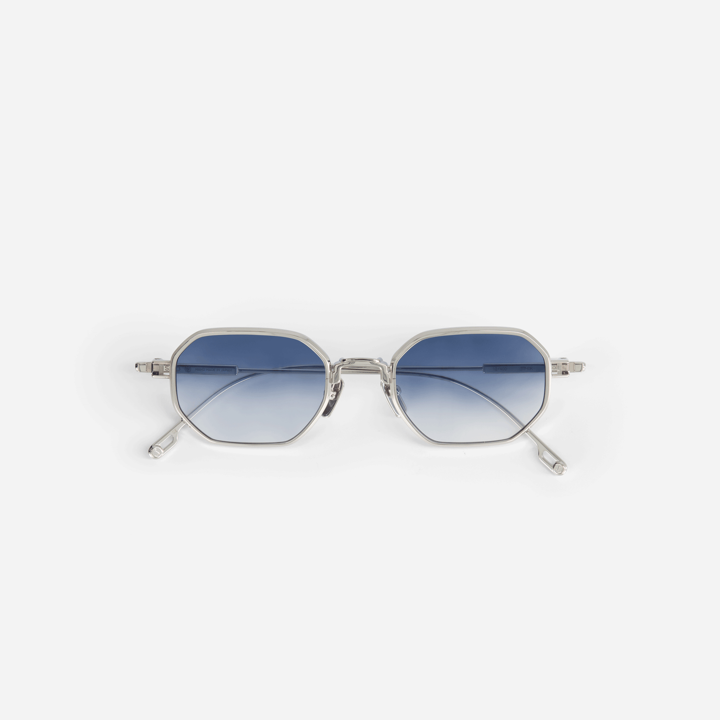 Timir S501, hexagonal glasses made from pure Japanese titanium with stunning blue gradient lenses.