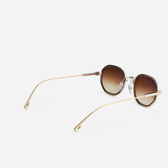Toliman-T S3303 hexagonal sunglasses, made from exquisite yellow gold and silver titanium. The brown gradient lenses and luscious chocolate brown insert.