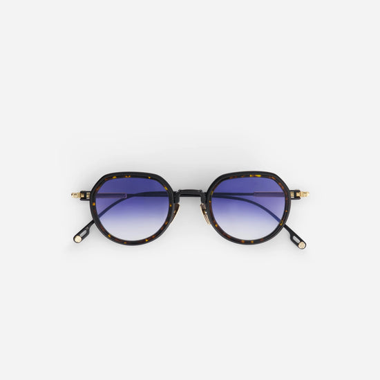 Belel-T S2206 sunglasses featuring blue gradient lenses and a stylish tortoise insert.
