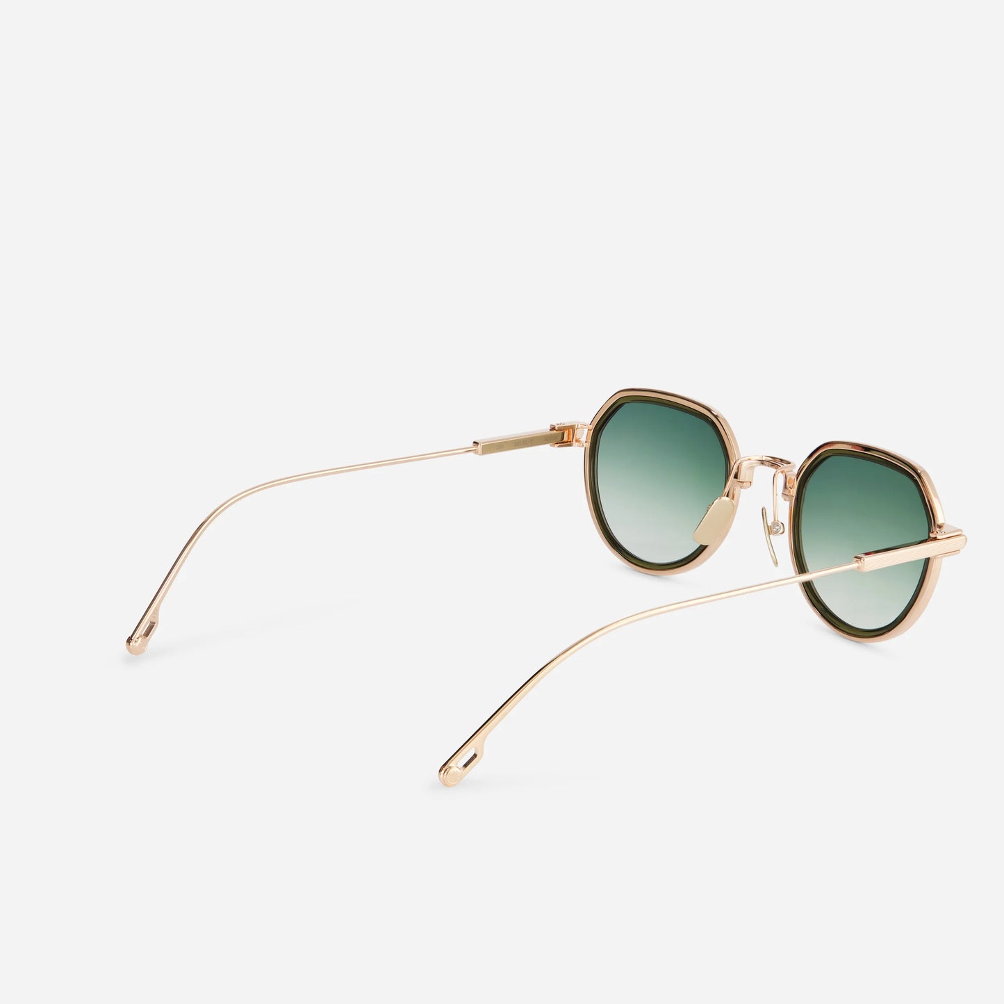 Belel-T S2209 sunglasses, beautifully designed in pure rose gold titanium, boasting green gradient lenses and a refined olive green insert.