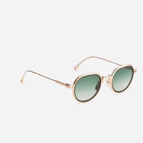 Experience luxury and style with Belel-T S2209 sunglasses, meticulously crafted in pure rose gold titanium, featuring green gradient lenses and an elegant olive green insert.