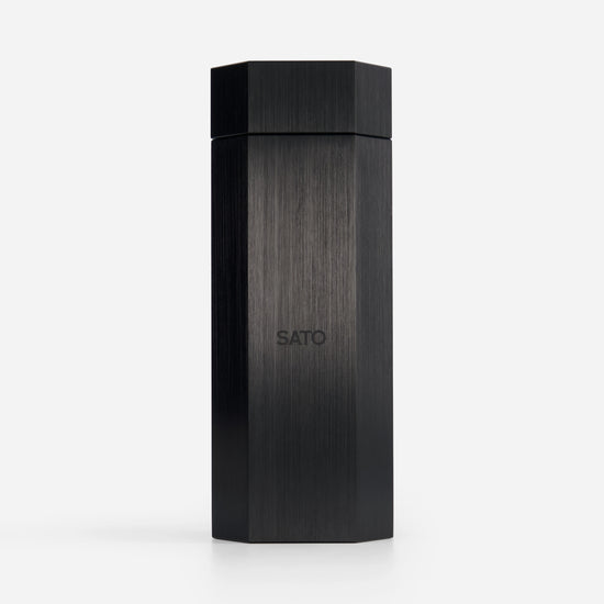 Black hexagonal container with 'SATO' branding on a white background