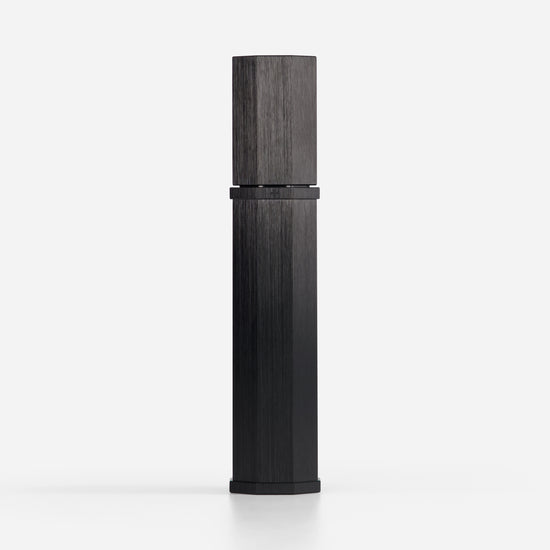 Black cylindrical product on a white background