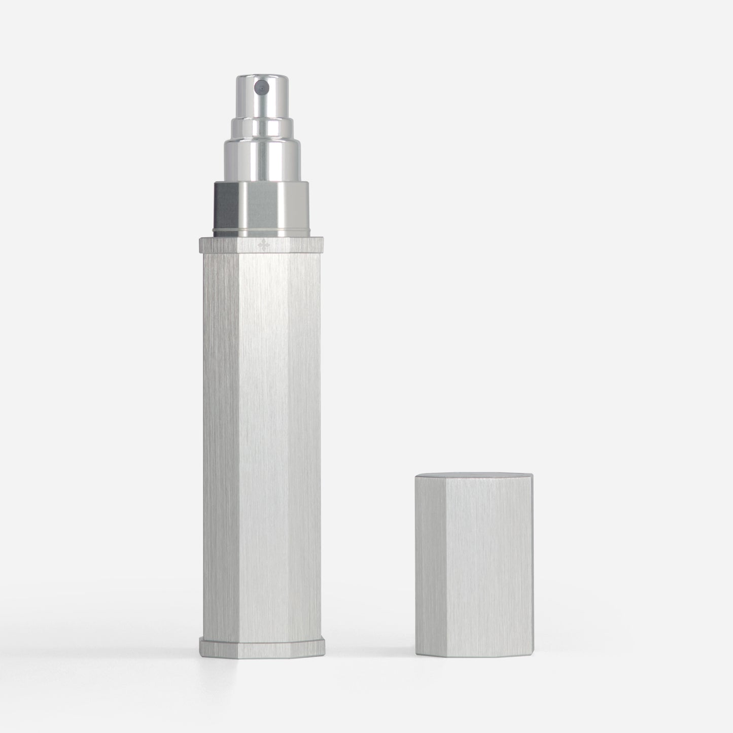 Silver spray bottle on a white background
