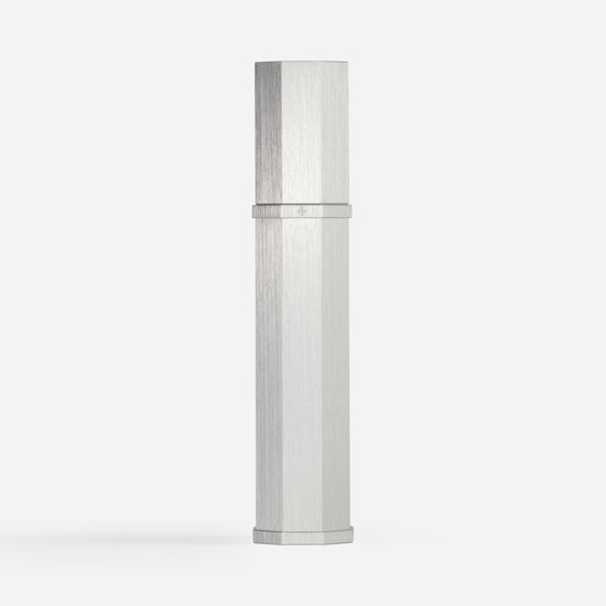 Silver cylindrical object on a white background