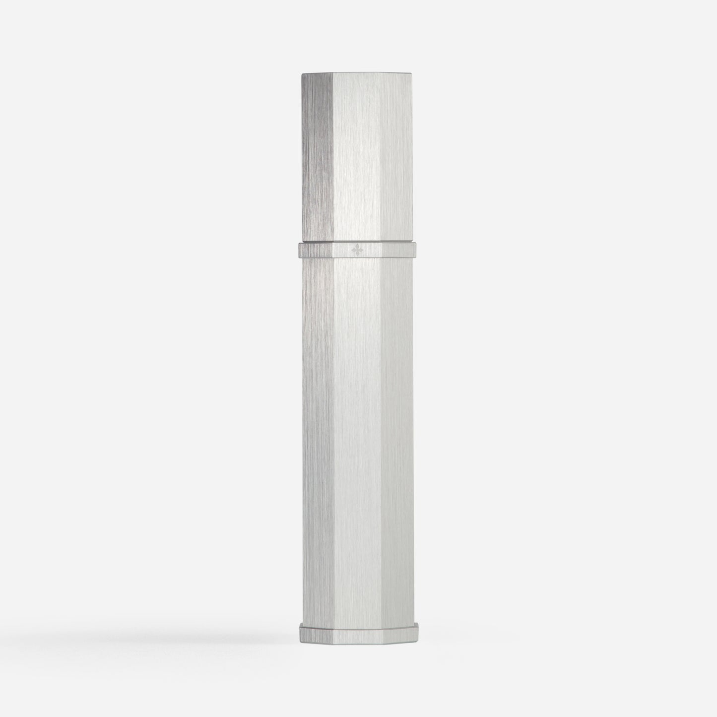 Silver cylindrical object on a white background